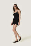 Black Dress featuring a discreet wire inserted into the hem - SS26