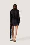 Black loose dress with an asymmetric cut and flowing side detail - SS26